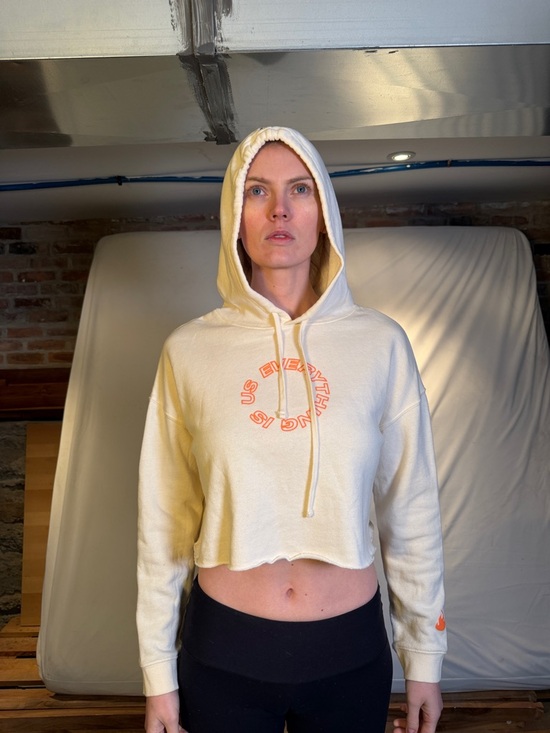 Tops - Cropped Cream Hoodie with Orange Graphic